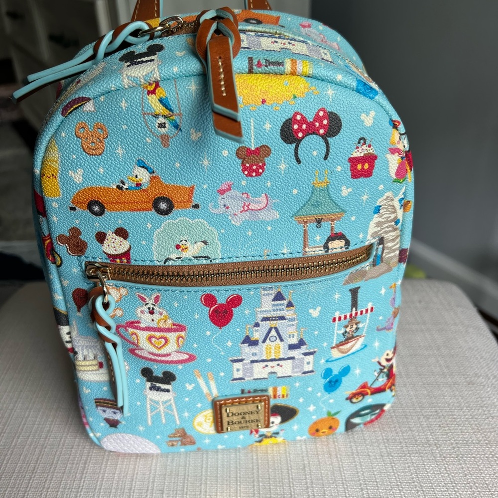 Disney Parks Dooney & Bourke Jarrod Maruyama A walk in the Park Backpack